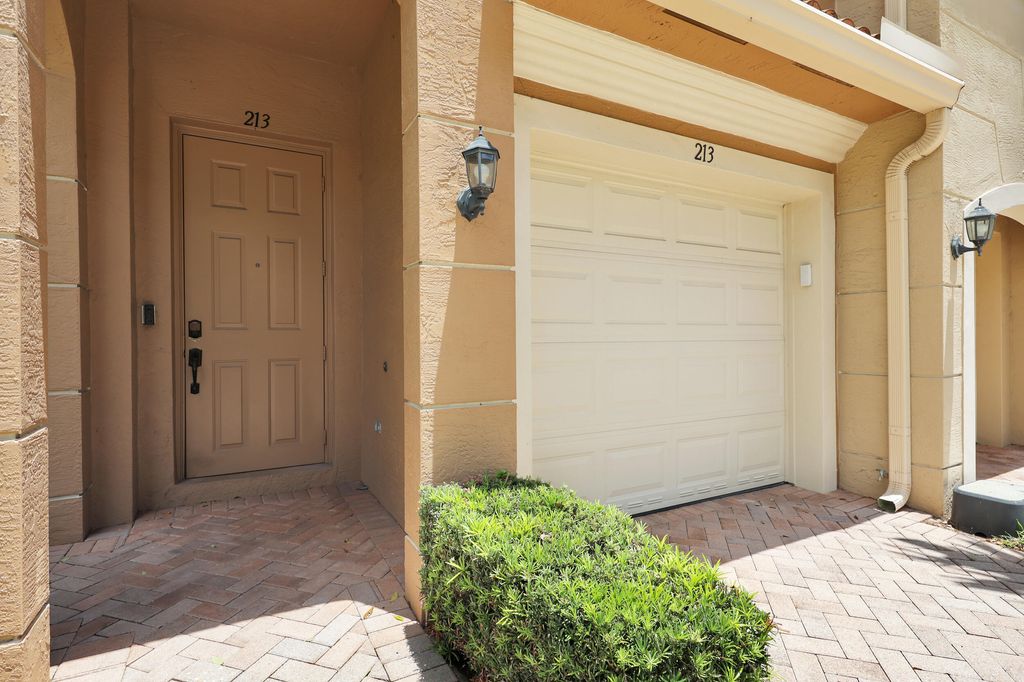 Photo of 4851 Bonsai Circle #213, Palm Beach Gardens, FL 33418 (MLS # B26031937)