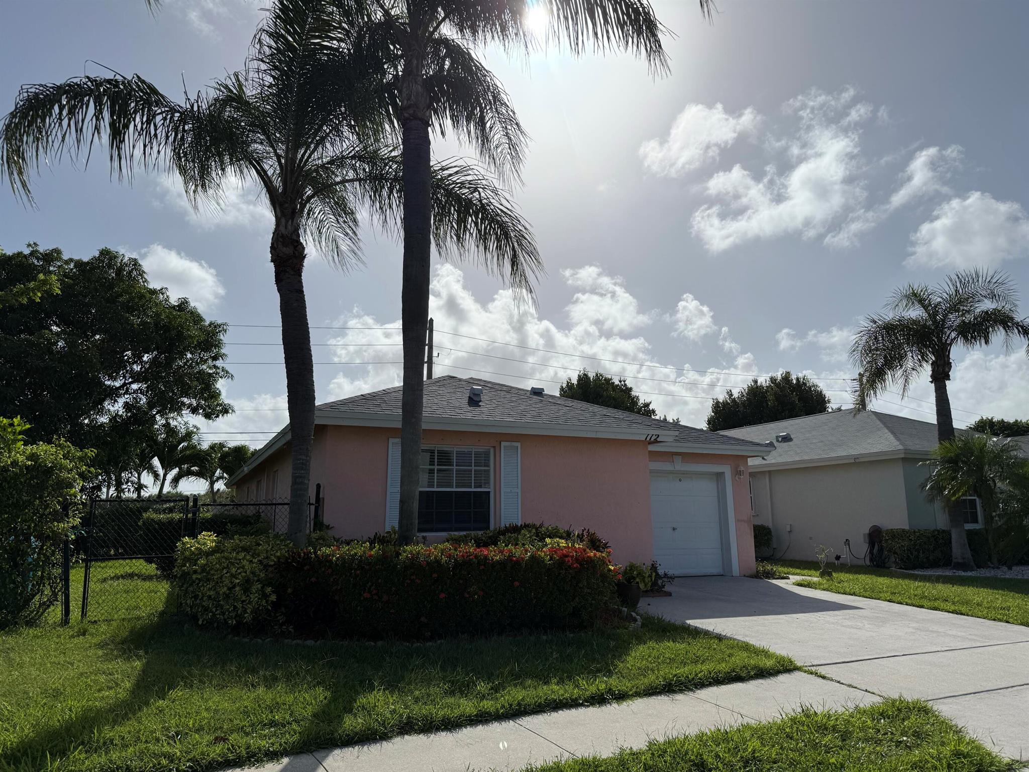 Well maintained corner lot home across from the community pool/clubhouse. Private fenced Backyard with Fruit Trees. Newer roof, newer appliances, updated kitchen and bathrooms. Freshly painted. Conveniently located next to I-95. All major stores and shops nearby.