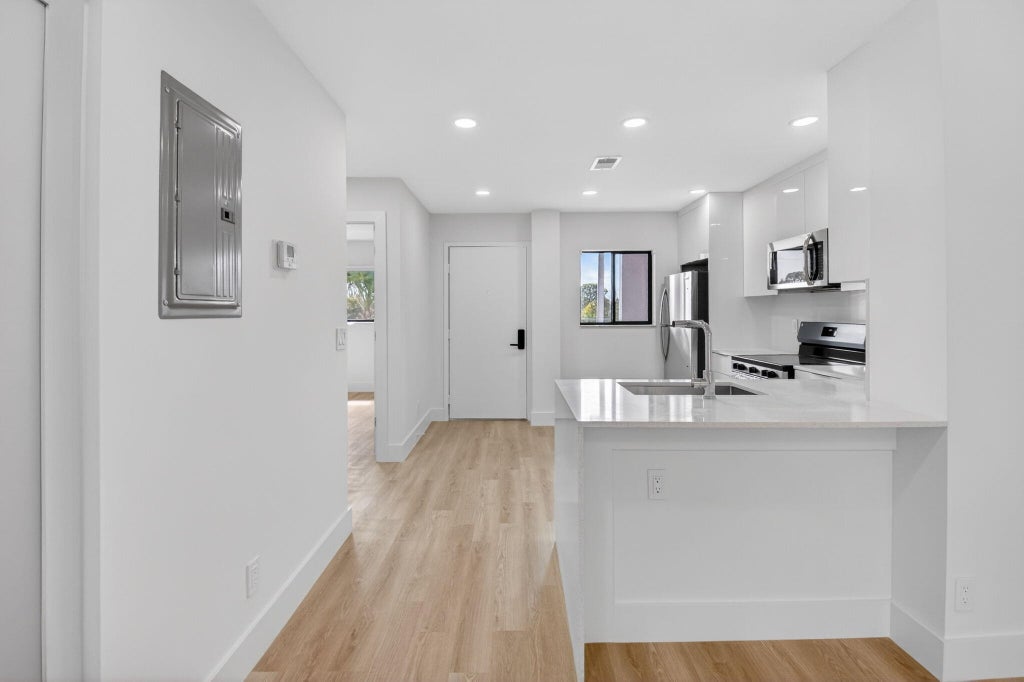 Photo of 100 W Hidden Valley Boulevard #502, Boca Raton, FL 33487 (MLS # B26059491)