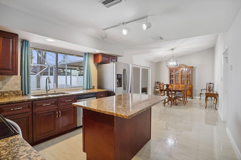 Photo of 9917 Moss Pond Drive, Boca Raton, FL 33496 (MLS # R10953496)