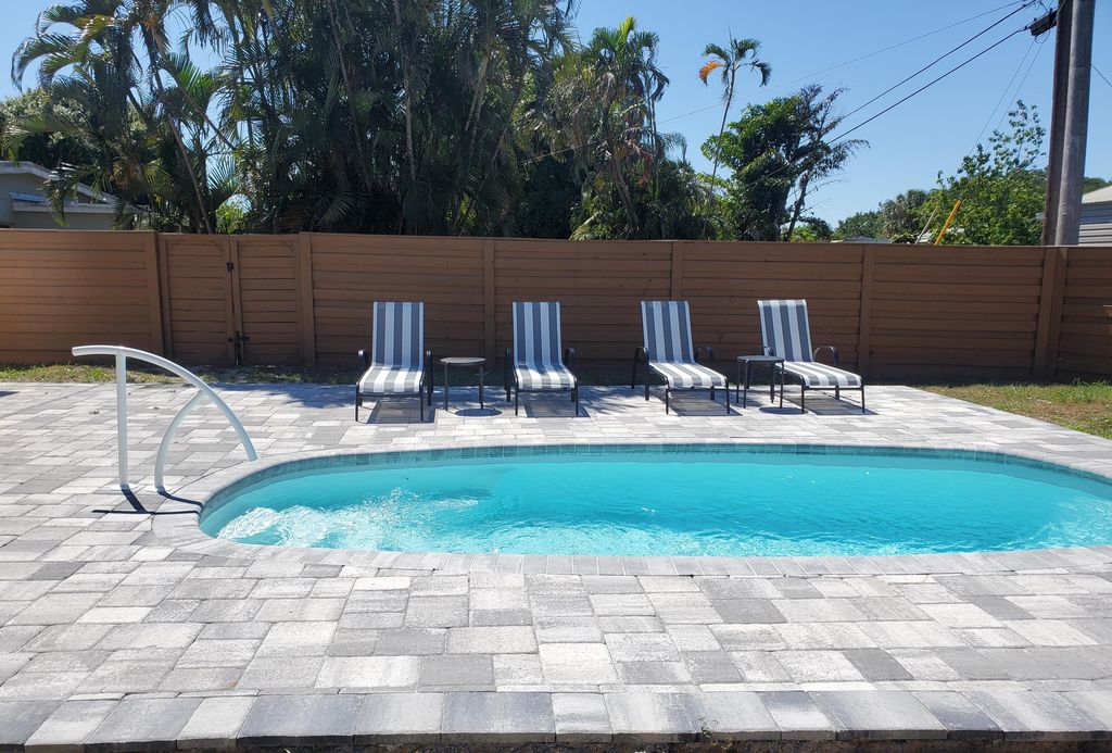 Photo of 121 SE Princess Dr, Port Saint Lucie, FL 34952 (MLS # B26002948)