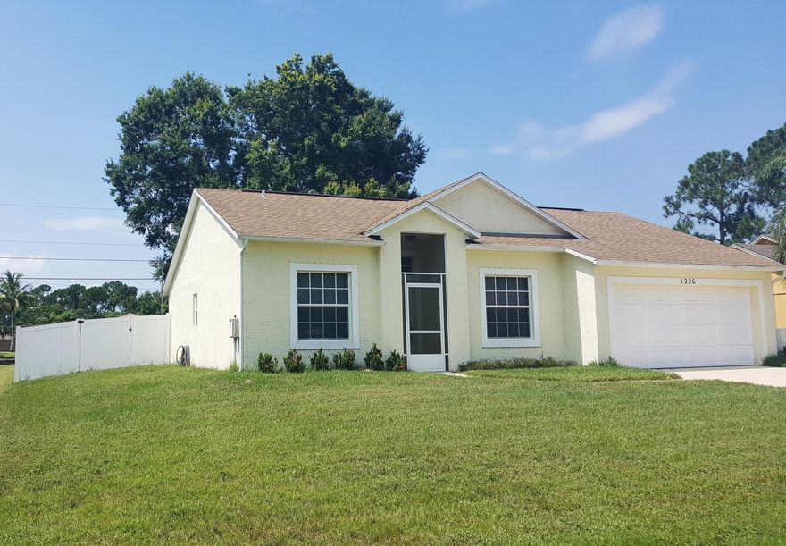 Available immediately! MUST SEE THIS BEAUTY! 3 bed/2 bath/ 2 car garage home with white vinyl fenced yard.  Kitchen features granite counters, eat in area and open access to family room.  New wood look laminate throughout living area which opens on to a large screened patio. Master bedroom features large walk in closet and dual vanity and updated shower.  Home includes washer/dryer, lawn mower and flat screen TV in the master bedroom.