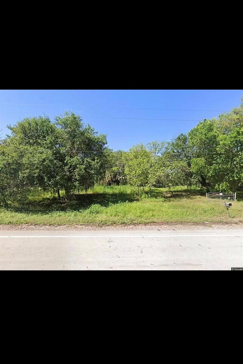 Discover this prime 2-acre waterfront residential lot nestled along Lake Okeechobee Rim Canal. With direct boating access to Lake Okeechobee, the Atlantic Ocean, and the Gulf of Mexico, this serene setting offers the perfect opportunity to build your dream home. Surrounded by beautiful oak, palm, cypress, and fruit trees, this tranquility property provides a peaceful escape with endless possibilities. Don't miss out on this rare chance to own a piece of waterfront paradise.
