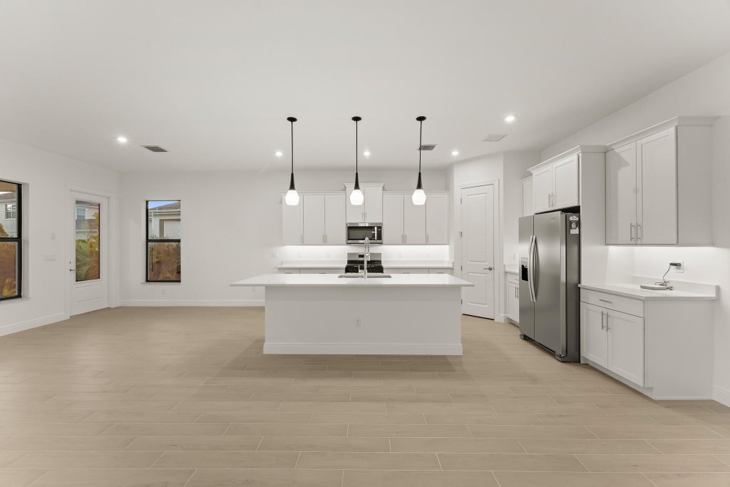 Photo of 691 SW Backus Lane, Palm City, FL 34990 (MLS # B26023880)