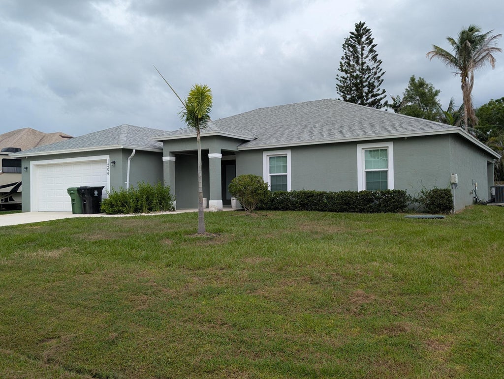 Photo of 1206 SW ASTURIA Avenue, Port Saint Lucie, FL 34953 (MLS # B26057013)
