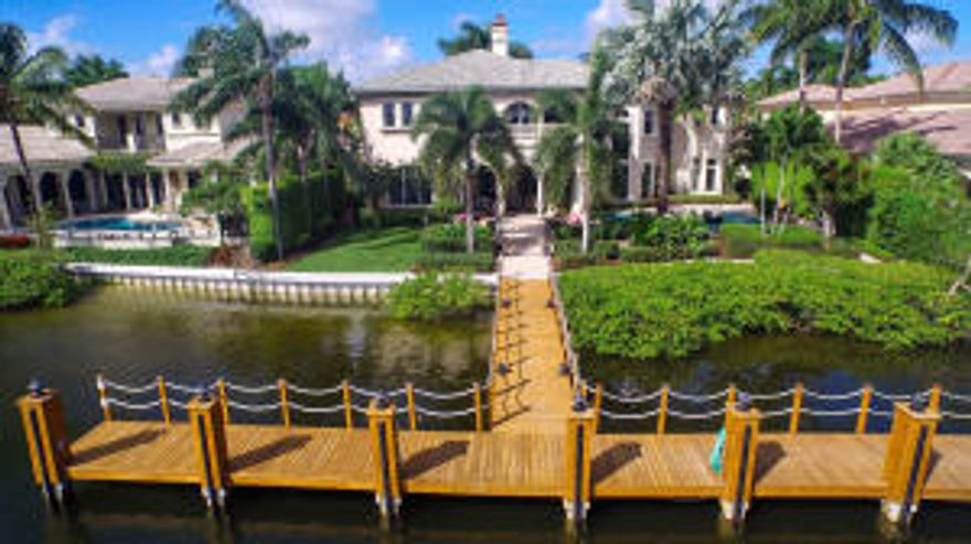 PRICE REDUCED $500k!!!
PRIVACY!  Best homesite in Harbour Isles with Golf Course beyond the North Palm Beach Waterway view. Gated Waterfront Comm Just off the Intracoastal! 100'On the Water. MAJOR RENOVATION in 2015!  Kitchen was remodeled for the most discerning Gourmet! Custom cabinetry envelopes
(2)Built-In Subzero Refrig,(2)Dishwashers,WOLF 6 Burner Gas cooktop with Range, Miele steamer,Conv micro,& warming drawer& Sep Icemaker.
Elevator.  Unbelievably Large Master Wing with His/Her Offices and His/Her Bathrooms.  Master Deck overlooks Waterway and Golf course. Salt Water Aquarium in LR Bar. Viking Prof. wine cooler built in Wine room off  DR.
Guest bedrooms are ensuite.  custom 8'Glass shower enclosures,new fixtures,flooring,counters,toilets, sinks ect. 
Outdoor kitchen renovated