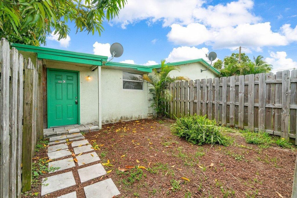 Photo of 3802 Melaleuca Lane #C, Lake Worth, FL 33461 (MLS # R11009661)