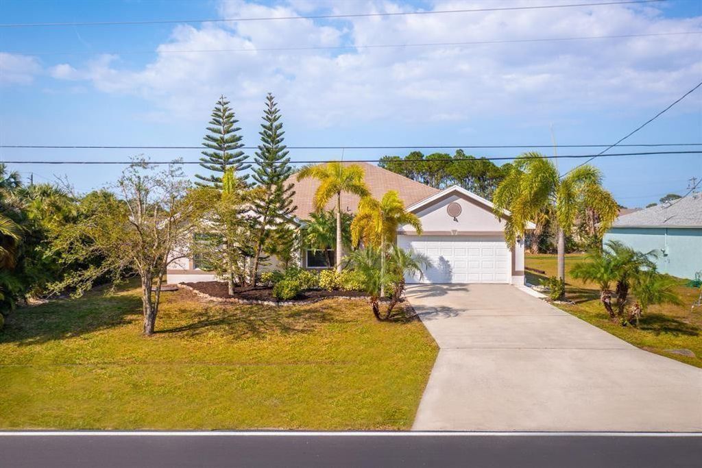 Photo of 585 NW Floresta Drive, Port Saint Lucie, FL 34983 (MLS # F10495653)