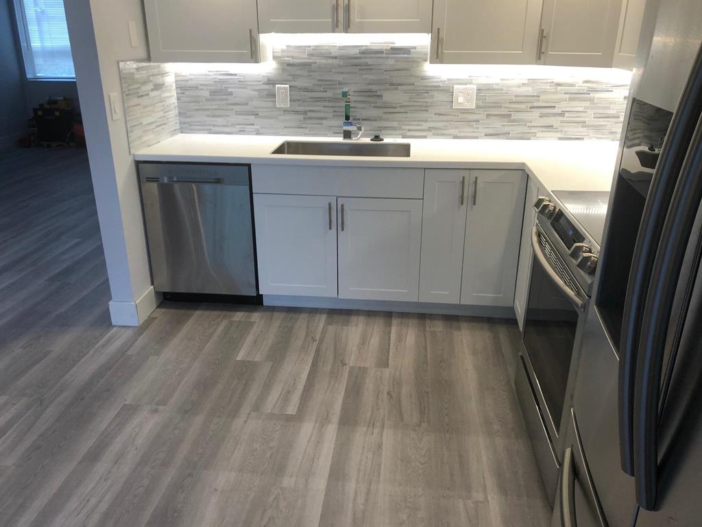 Located within this Gated Community of Delray Beach is this fully renovated corner unit that has fantastic Lake Views and tons of natural light. New Stainless Steel Appliance Package. Enjoy the South Florida lifestyle with resort like amenities including golf, tennis,indoor/outdoor swimming pools,fitness center,restaurants,salon, transportation and more. This Unit has a new open kitchen with Stainless Steel Appliances, Shaker Wood Cabinets, Quartz Counter-top, Cararra White Marble Tiled Bathrooms. New Upgraded Lighting & Plumbing Fixtures, Screened Patio overlooking the Lake. Low Affordable Monthly Maintenance.