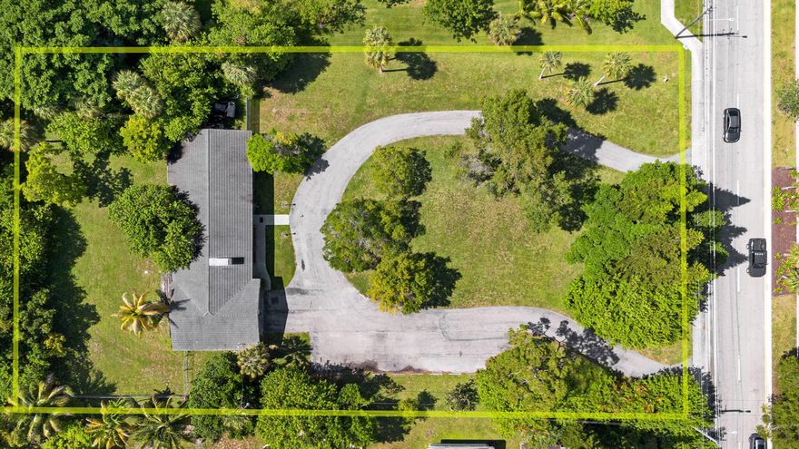 Expansive 1.22-Acre Property with Endless Possibilities in Tamarac!This rare 1.22-acre lot features a spacious 4-bedroom, 3-bath home offering comfortable living and room to grow. The residence includes a private in-law suite, vaulted ceilings, impact windows, and a cozy wood-burning fireplace--perfect for multi-generational living or income potential. Enjoy the privacy and space of acreage living while being minutes from major conveniences and the Turnpike.For developers and investors, this is a true opportunity. Zoned R-1 with a Low 5 Residential Overlay, the property offers potential to subdivide and build up to five single-family homes per acre (subject to city approval). The lot backs up to the newly built Manor Parc community, sits across from luxury homes in the Woodlands Golf