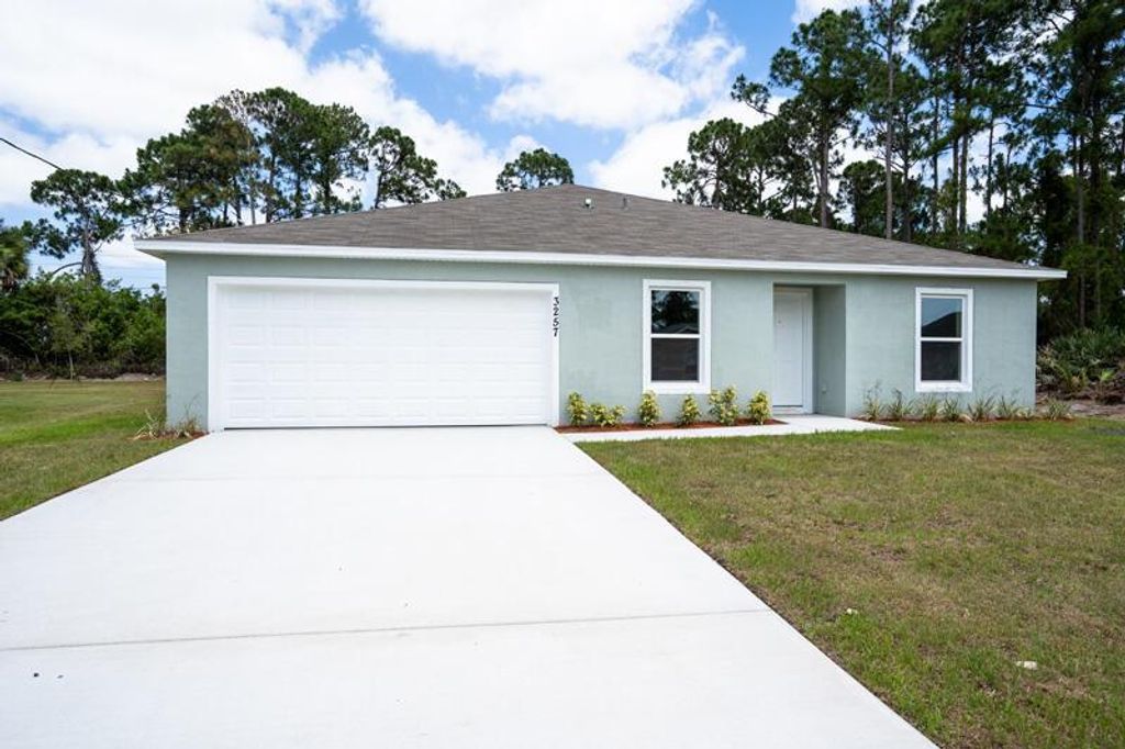 Photo of 2573 SW Savage Boulevard, Port Saint Lucie, FL 34953 (MLS # R10714906)