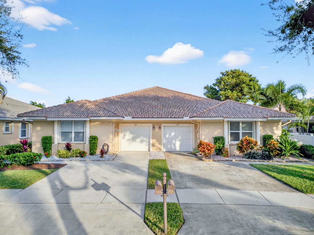 Photo of 233 W Coral Trace Circle W, Delray Beach, FL 33445 (MLS # R11144657)