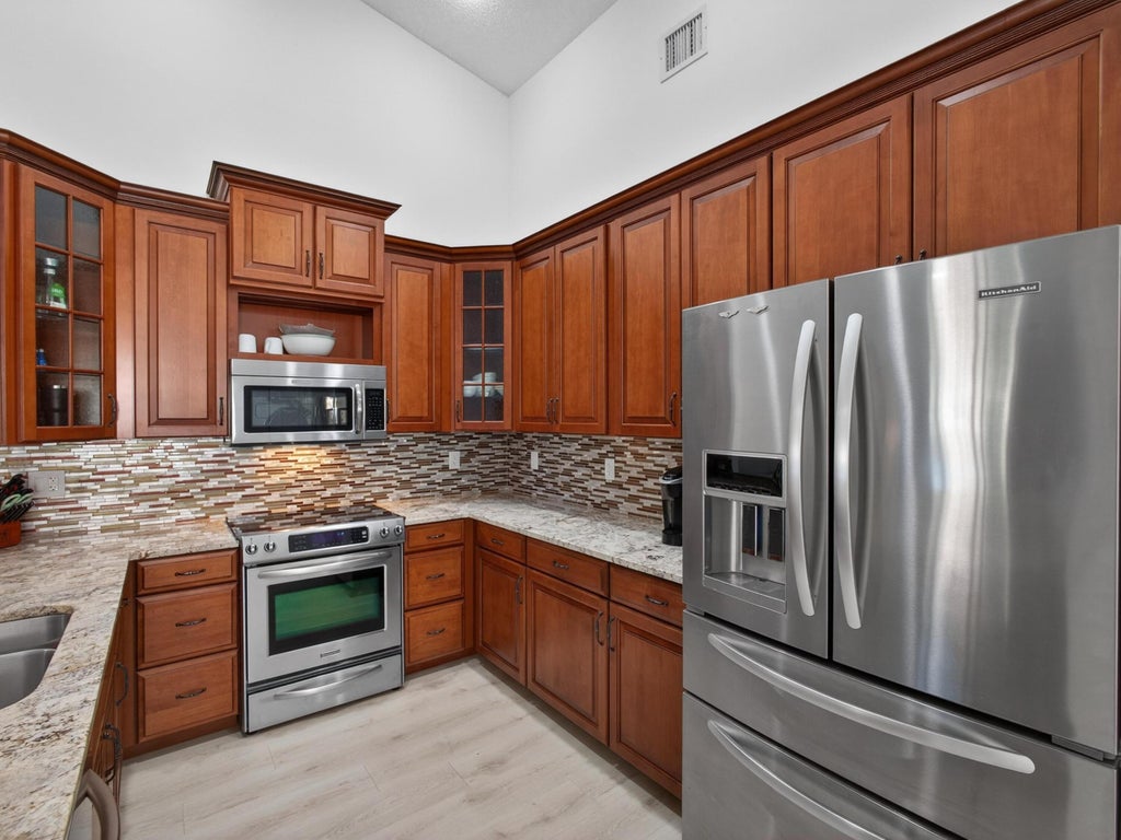Photo of 233 W Coral Trace Circle W, Delray Beach, FL 33445 (MLS # R11144657)