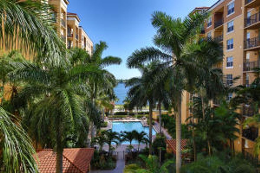 Brand New Carpet, Paint and faucets!This Condo comes with 2 Parking spots!!! Sit on the balcony and watch the yachts go by in this resort style building!