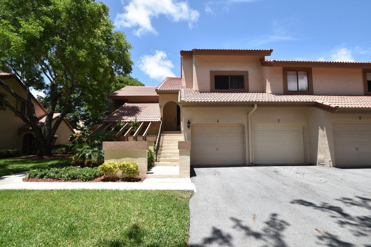 Come see this beautifully remodeled light, bright, and spacious coach home. Brand new porcelain tile throughout living area and new porcelain tile ''wood look'' flooring in the bedrooms. Updated kitchen with granite countertops and stainless steel appliances (brand new stainless steel refrigerator being delivered next week). Remodeled master bathroom, crown molding, freshly painted, full sized washer dryer, lots of closet space, high end fixtures. This beautiful coach home has an attached garage (laminate flooring on garage stairs in process of being installed). Spacious patio with garden view. Two community pools within subdvision. Condo fee includes roof, insurance, cable, landscaping, and water. Pet-friendly community. Minutes from great shopping, dining, and major highways.