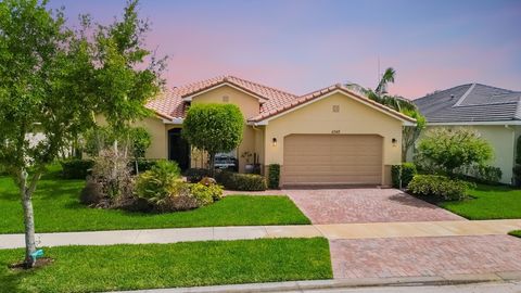 Photo of 11547 SW Apple Blossom Trail, Port Saint Lucie, FL 34987 (MLS # B26010694)