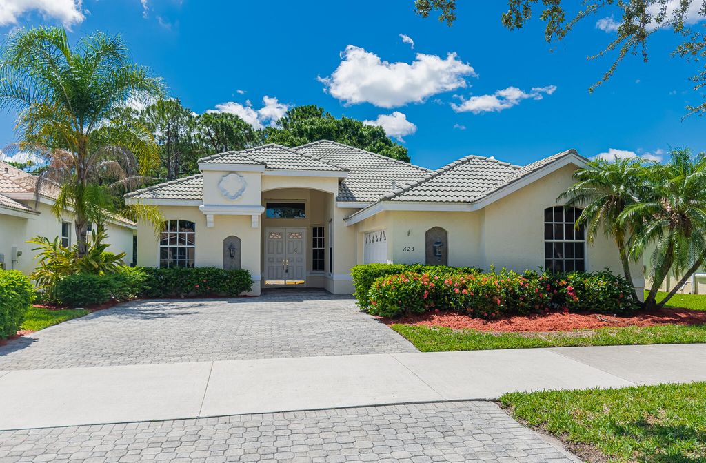 Photo of 623 SW Lake Charles Circle, Port Saint Lucie, FL 34986 (MLS # R10995065)