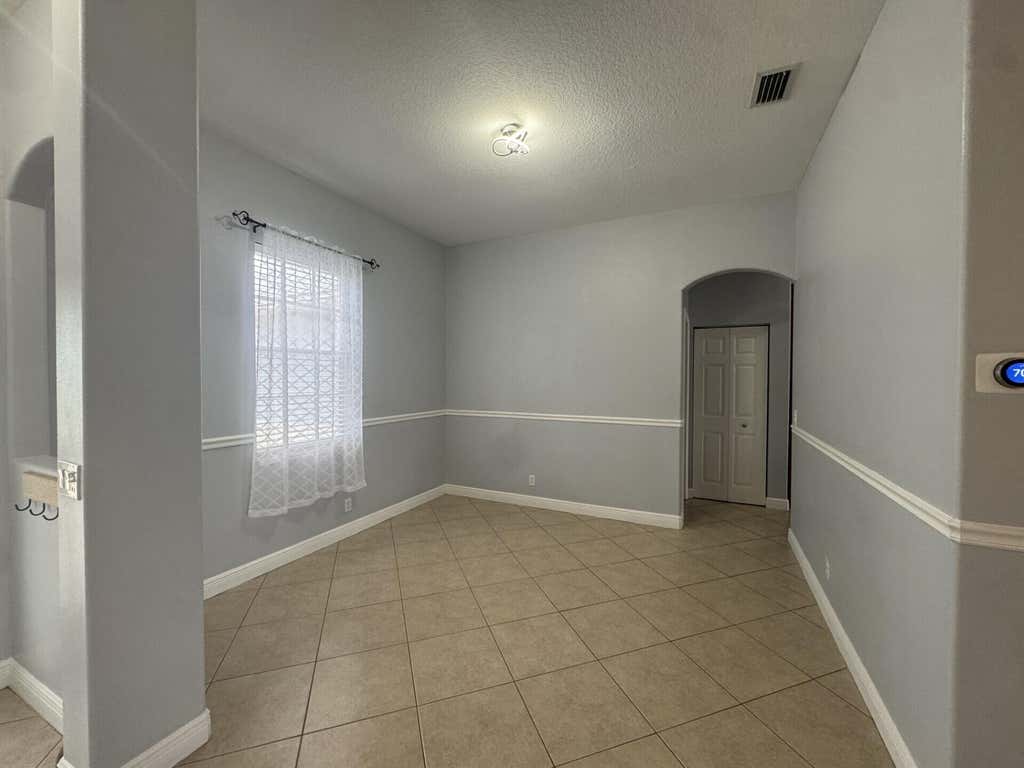 Photo of 997 SW Hamberland Avenue, Port Saint Lucie, FL 34953 (MLS # B26039747)