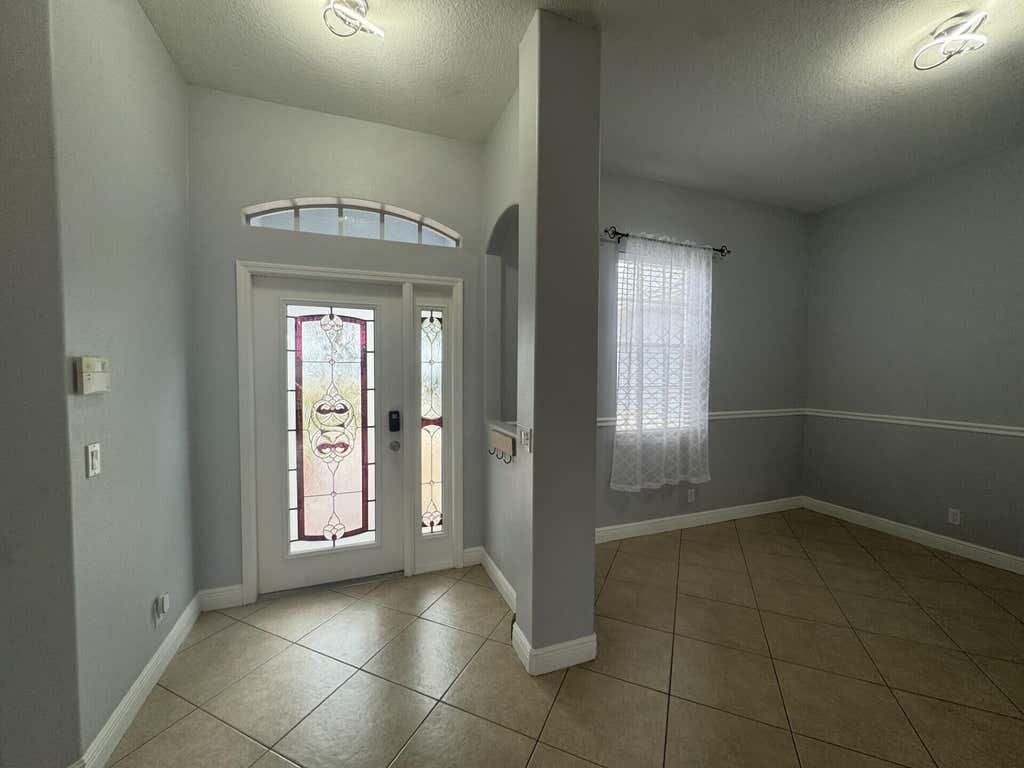 Photo of 997 SW Hamberland Avenue, Port Saint Lucie, FL 34953 (MLS # B26039747)