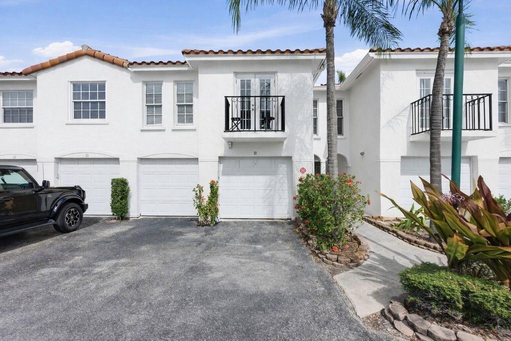 Photo of 1155 Lake Shore Drive #202, Lake Park, FL 33403 (MLS # R11161682)