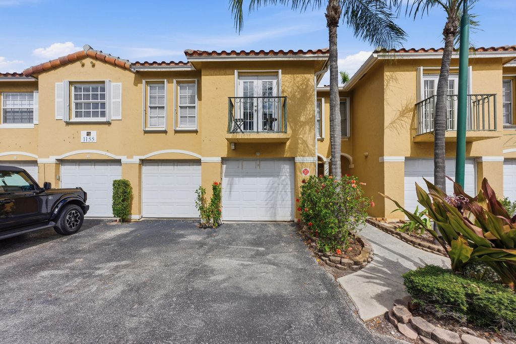 Photo of 1155 Lake Shore Drive #202, Lake Park, FL 33403 (MLS # R11161682)