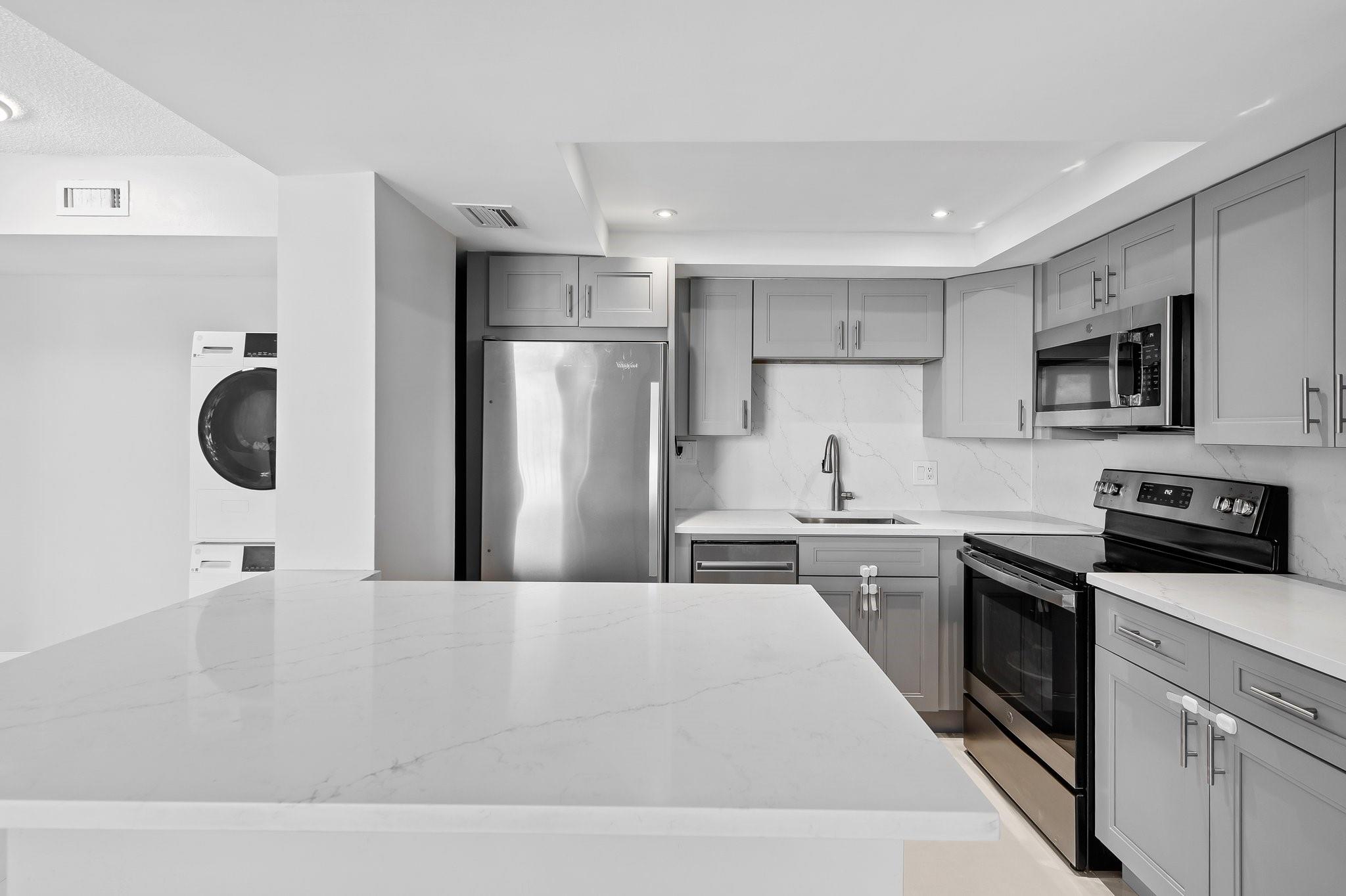 Welcome to your new home in East Fort Lauderdale! This completely updated 2 bedroom, 2 bath condo offers a south-facing view that fills the unit with natural light. Ideally located just a few blocks from the 17th Street Causeway, this condo provides easy access to all the city has to offer, including the beaches, Las Olas shopping and dining district, FLL Airport, Flagler Village, etc. Harbor Shops is right down the road, making everything you need within walking distance.
This split bedroom floor plan includes a spacious balcony, an in unit (ventless) washer/dryer and one covered parking space. An extra parking space is available with a permit from the association, but there is plenty of guest parking. The building has a pool, sun deck, and a BBQ grill area. Furniture is negotiable.