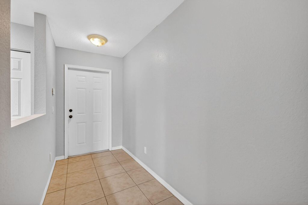 Photo of 2245 Portsmouth Lane, Port Saint Lucie, FL 34953 (MLS # B26009408)