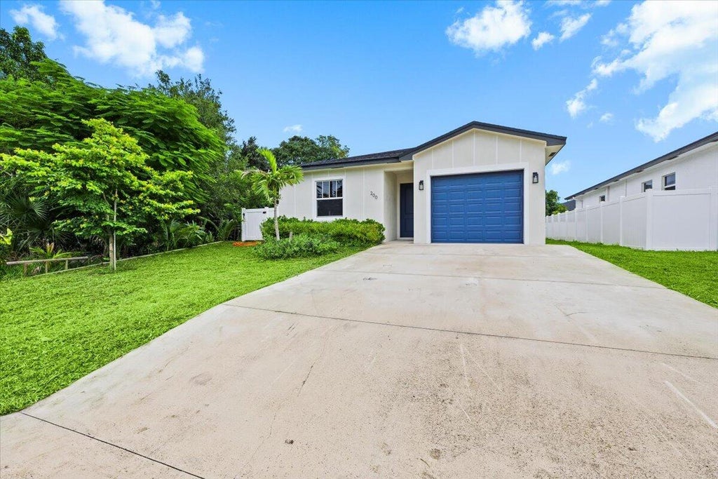 Photo of 200 Marie Drive, West Palm Beach, FL 33415 (MLS # B26061127)
