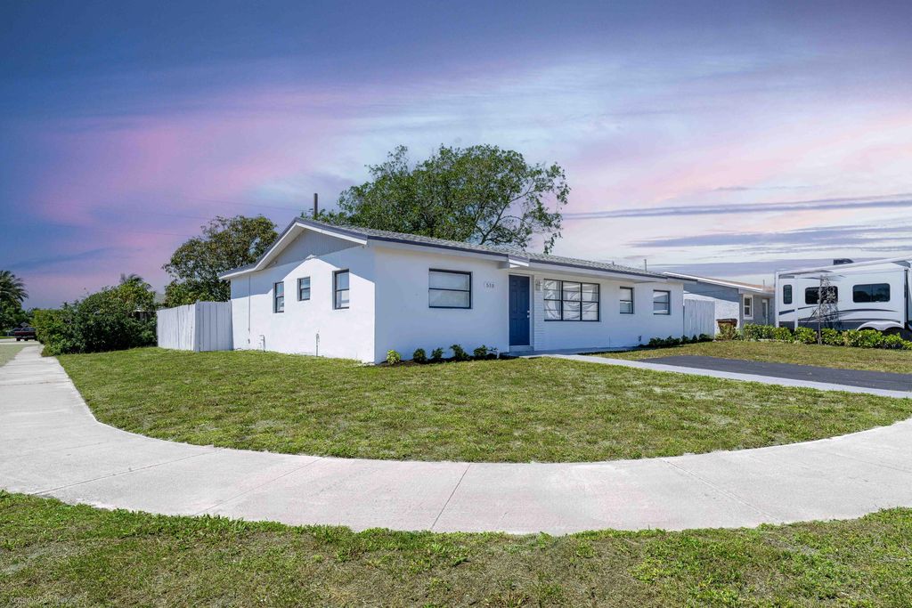 Photo of 510 SW 13th Place, Deerfield Beach, FL 33441 (MLS # B26026959)