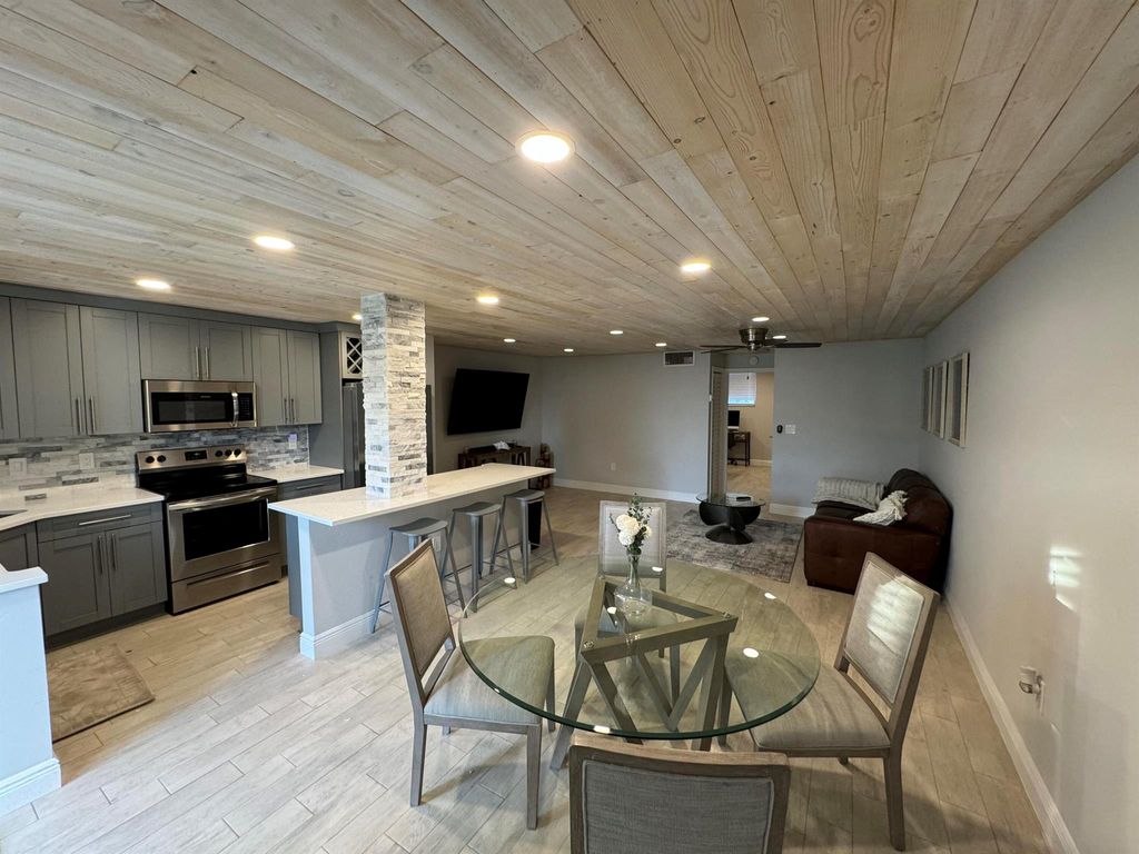 Photo of 108 Paradise Harbour Blvd #103, North Palm Beach, FL 33408 (MLS # R10947007)