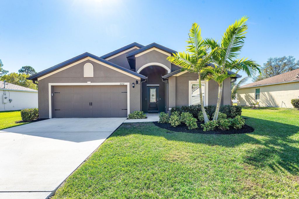Photo of 1652 SW Penrose Avenue, Port Saint Lucie, FL 34953 (MLS # R11161396)