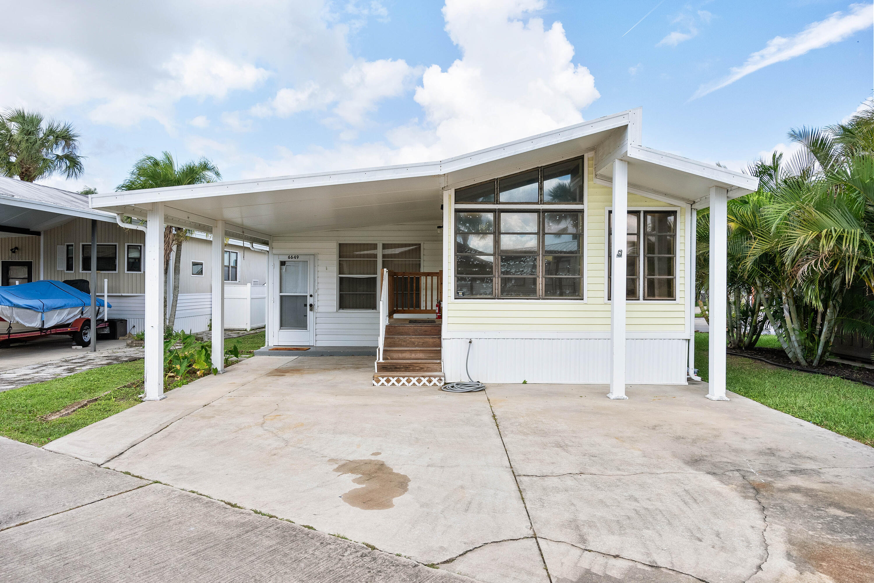 Welcome to this delightful, recently updated home located in the highly sought-after 55+ community of Ancient Oaks. Perfectly situated in a tranquil, welcoming neighborhood, this home features a new roof, kitchen, flooring, and updated bathroom to provide an inviting space to relax and enjoy in style and comfort.Ancient Oaks is an active 55+ community with many amenities including a large screened in heated pool & spa, a marina with docks, boat ramp, fish cleaning station, Shuffleboard courts, community laundry rooms, and a recreation hall with a library, bingo & exercise room.