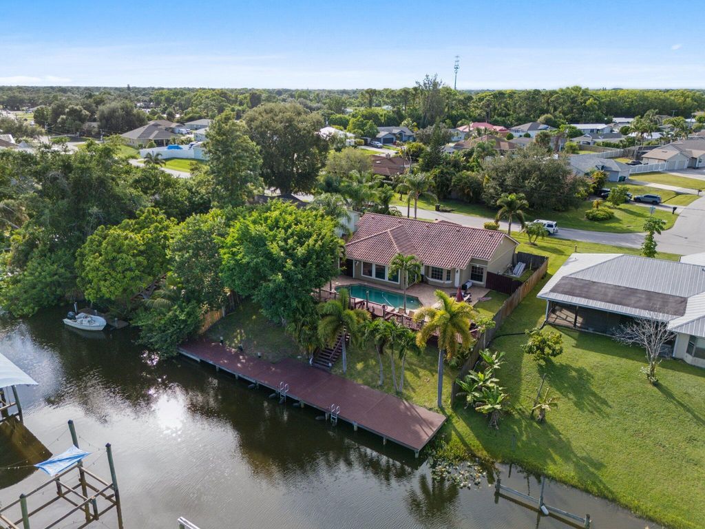 Photo of 138 NE Twylite Terrace, Port Saint Lucie, FL 34983 (MLS # R11124324)