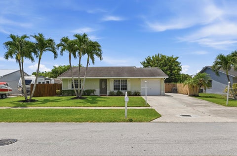 Photo of 4732 CARTHAGE Circle S, Lake Worth, FL 33463 (MLS # B26053628)