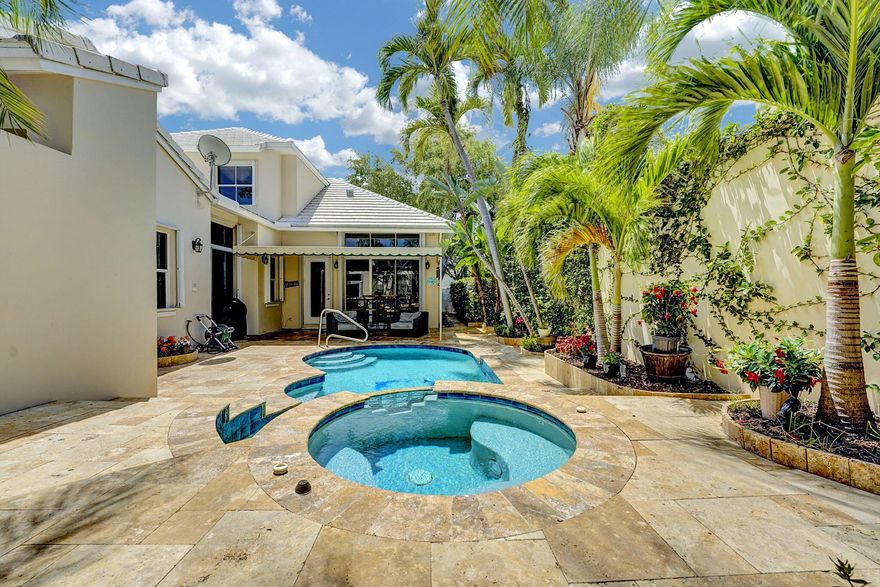 Welcome to your own private oasis in one of the most sought- after country club communities-with NO MANDATORY MEMBERSHIP! This elegant two story townhouse offers the perfect blend of renovation with resort style living. Step inside to find 3 spacious bedrooms, 2.5 bathrooms, and an open, light filled layout designed for both relaxing and entertaining. The heart of the home extends outdoors to a lush private courtyard, where a sparkling pool and spa with waterfall feature await. Beyond the courtyard you will find a second covered patio terrace on the back of the exterior of the property, with large space that is perfect for lounging, dining, etc. All nestled In a prestigious all ages golf/tennis country club resort style community. Perfect location/Central Boca with amazing school zoning.