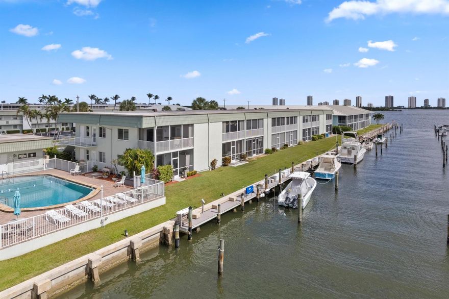 The perfect waterfront pied-a-terre  in North Palm Beach enjoy this lovely one bedroom, one bath apartment with its own laundry, covered balcony, with views of the canal and intracoastal. This would make the perfect boat captain pad, guest apartment, seasonal getaway, or enjoy it as your new home. The building is next to the community swimming pool and grill area. There is assigned parking and plenty of guest spots. The unit has hurricane protection a new air-conditioning system and is in move-in condition. The boat slips are available to rent, there is currently a waiting list. Easy to show.