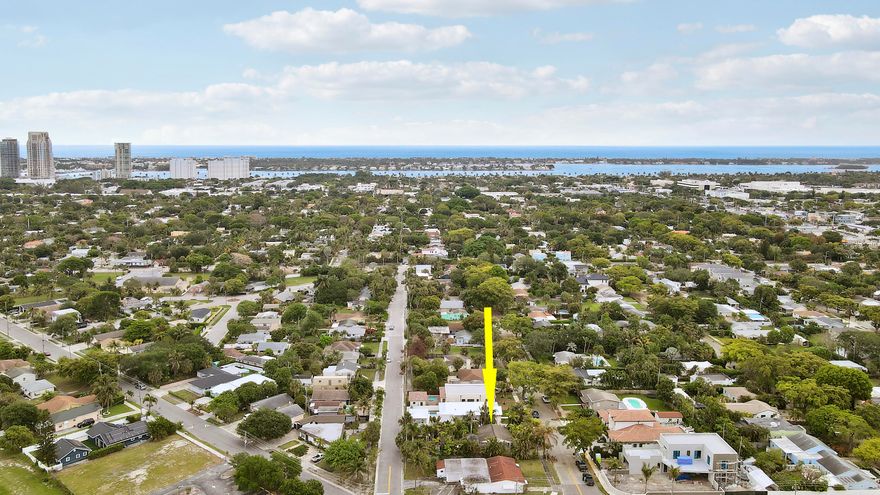 Location and value in one of West Palm Beach's most dynamic and fast-moving neighborhoods. This 9,500 sq ft parcel in the heart of Pineapple Park puts you minutes from the boutiques, dining, and nightlife of CityPlace, the scenic beauty of Flagler Drive and the West Palm Beach waterfront, and all that vibrant downtown West Palm Beach has to offer. Palm Beach International Airport is just a short drive away — a rare convenience that residents and renters alike appreciate. World-class amenities, practically at your doorstep. And you're not just close to the action — you're right in the middle of a community in full stride. New construction homes have recently been completed next door and across the street, with more continuing to come out of the ground throughout the neighborhood. This oversized lot delivers 75 ft of frontage along Ardmore Rd plus the rare advantage of dual access via a separate driveway off Charles St — a dream for flexible site planning. Existing improvements include a 2BD/1BA single family home, a sparkling pool, and a detached two-car garage accessible from Charles St with a 2BD/1BA apartment above. Live in one, rent the other, or hold and build — 1023 Ardmore delivers the lot, the location, and the flexibility to make it your own.