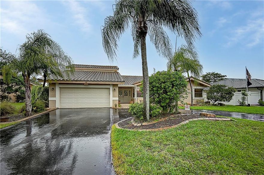 Come live in the family friendly, highly desired community of Cypress Run in Coral Springs. This move in ready open spacious 4 bedroom 2.5 bath  builders home is completely renovated and equipped with many upgrades: Vaulted ceilings, wood burning fireplace, plantation shutters, Saturnia marble floors, custom closets, alarm security system, paver deck, pool, vinyl fencing, granite BBQ grill area and hurricane shutters. Dream home for those who like to entertain. Bonus no HOA fees to live in this community.Easy access to Sawgrass Expressway which is great for commuters.