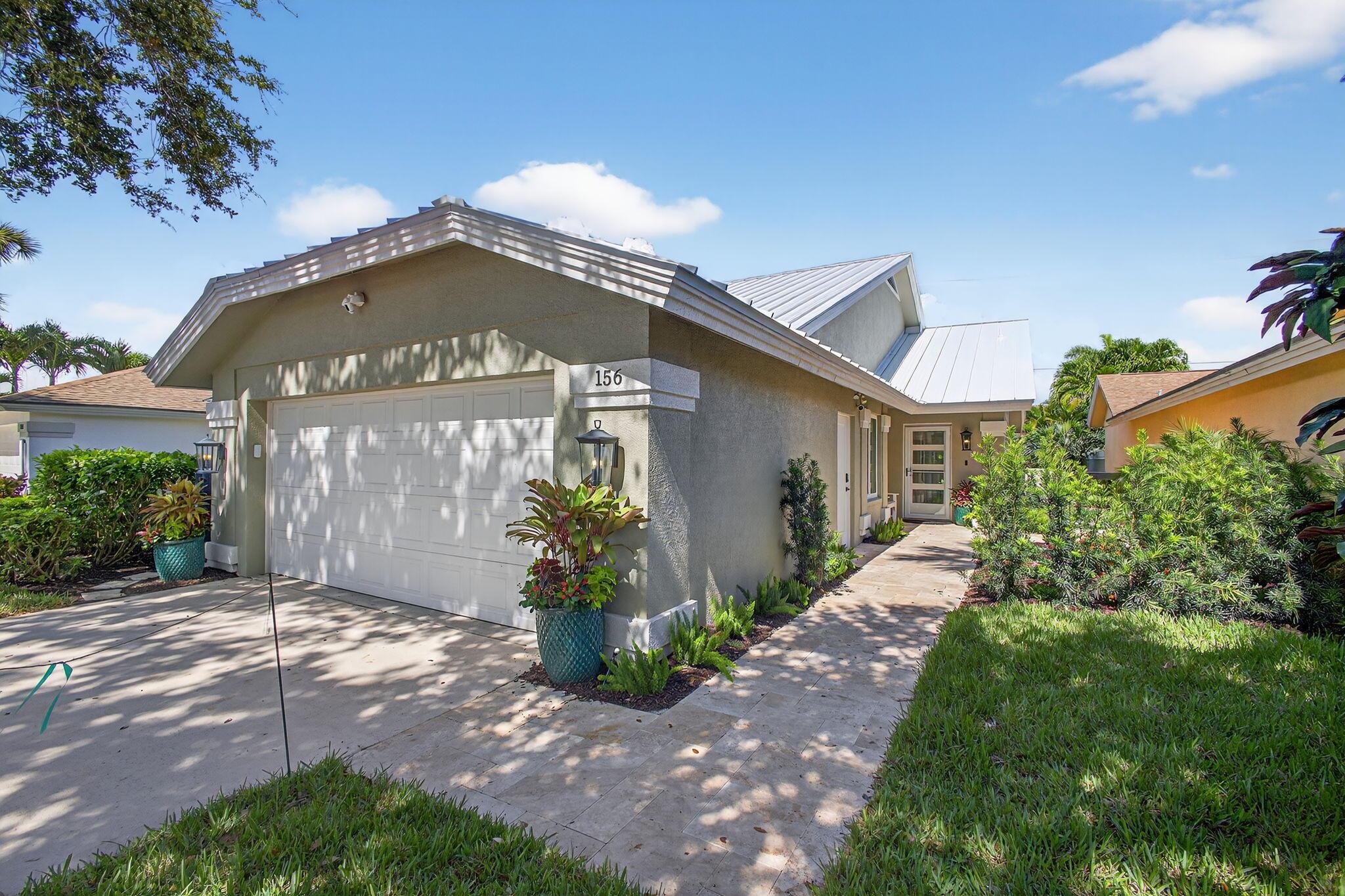 Impeccable 3-Bedroom, 2-Bath Home in The Bluffs - Just Steps from the Beach! Located in the highly sought-after, pet-friendly community of The Bluffs Ridge, this beautifully renovated single-family home is the ultimate beachside retreat--just a short walk to the ocean. No detail has been overlooked in this thoughtfully updated residence. Inside, you'll find wide plank tile flooring throughout the main living areas, new carpet in all bedrooms, elegant Serena & Lily light fixtures, all-new baseboards and trim, updated interior doors, and a fresh, cohesive aesthetic that blends coastal style with modern comfort. The chef-inspired kitchen features premium appliances, including a Liebher refrigerator, KitchenAid induction stove, and