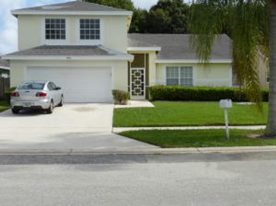 Here's your opportunity to live and own a GL Home for a fraction of the price of a new home. This 4 bedroom 2.5 half bath, has a wonderful floor plan, featuring the master bedroom on the ground floor. All the rooms are spacious. You have a nice formal living room and dining room.. Then you walk into your kitchen and you will love the size! It's light, bright and opens to the family room and breakfast nook.. This is the Hub of the home. It also has a snack counter a pass through window to your expanded roofed and screened patio. Perfect for entertaining and family barbecue's. The yard is tremendous.. a pool would be the perfect fit. Or imagine a tiki hut and play area.. So many possibilities! Let's not forget your other bedrooms. The other 3 are upstairs. They are all good size rooms..