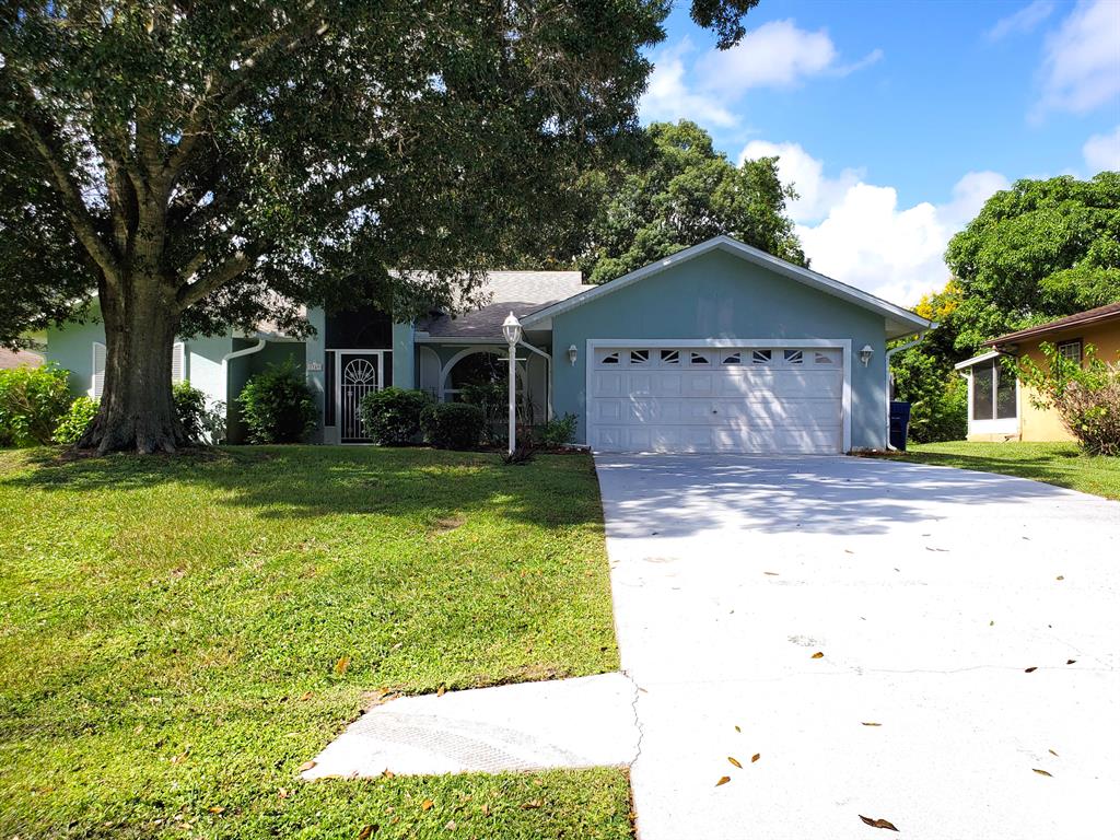 Revamped and ready to be sold! Beautiful home with high ceilings, formal dining area and combination kitchen and living room. Large extra room that could be used as a game room or additional entertaining area. Watch the sunsets from the screened porch or the sunrise from the garage that has screen doors!