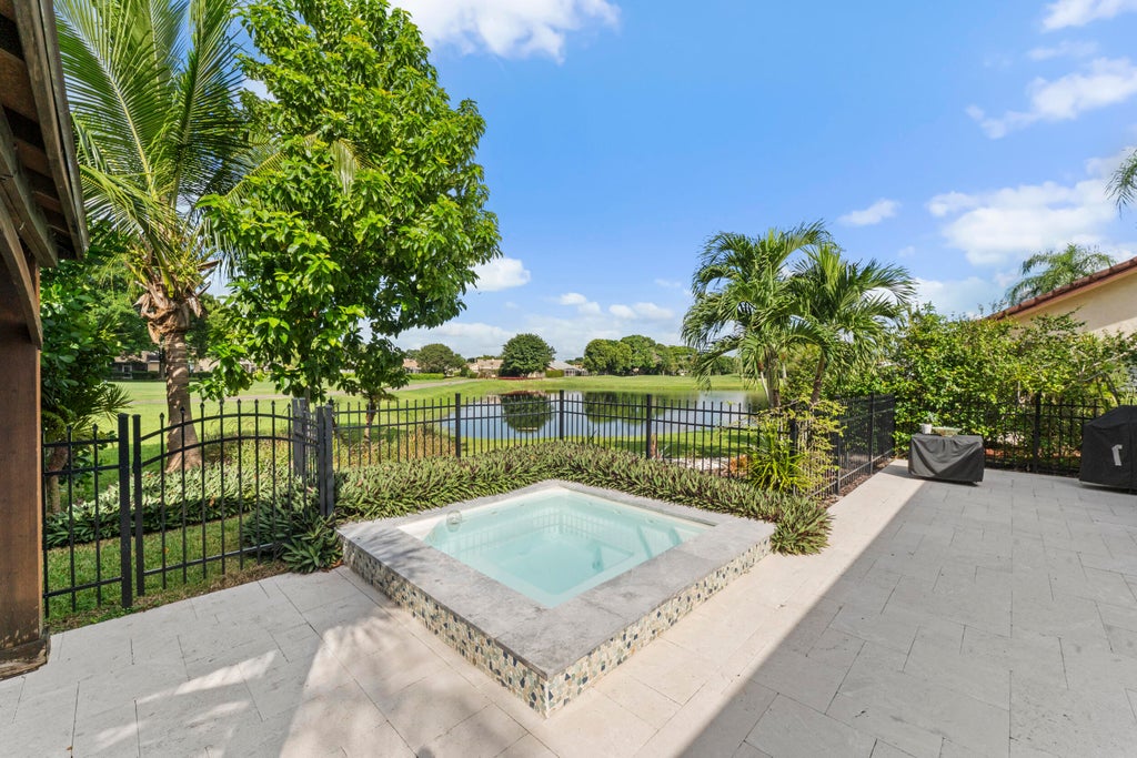 Photo of 7029 GOLF POINTE Circle, Tamarac, FL 33321 (MLS # B26093191)