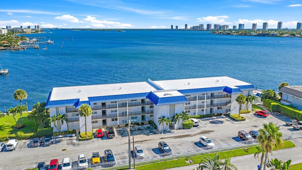 Photo of 400 Wilma Circle #108, Riviera Beach, FL 33404 (MLS # B26015352)