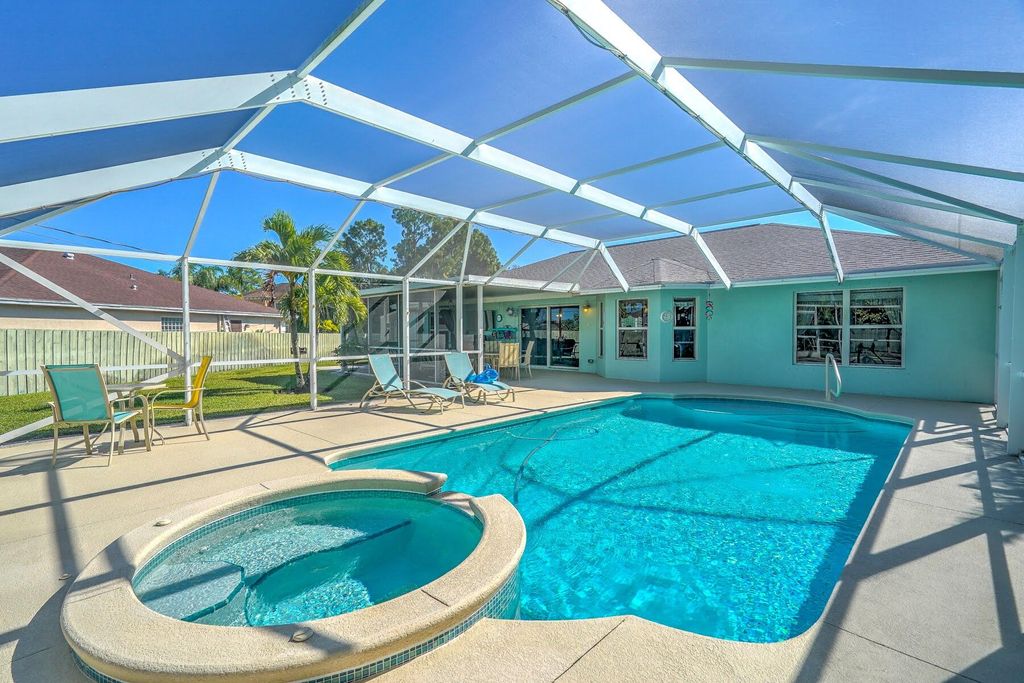 Photo of 626 SW Homeland Road, Port Saint Lucie, FL 34953 (MLS # R10934963)