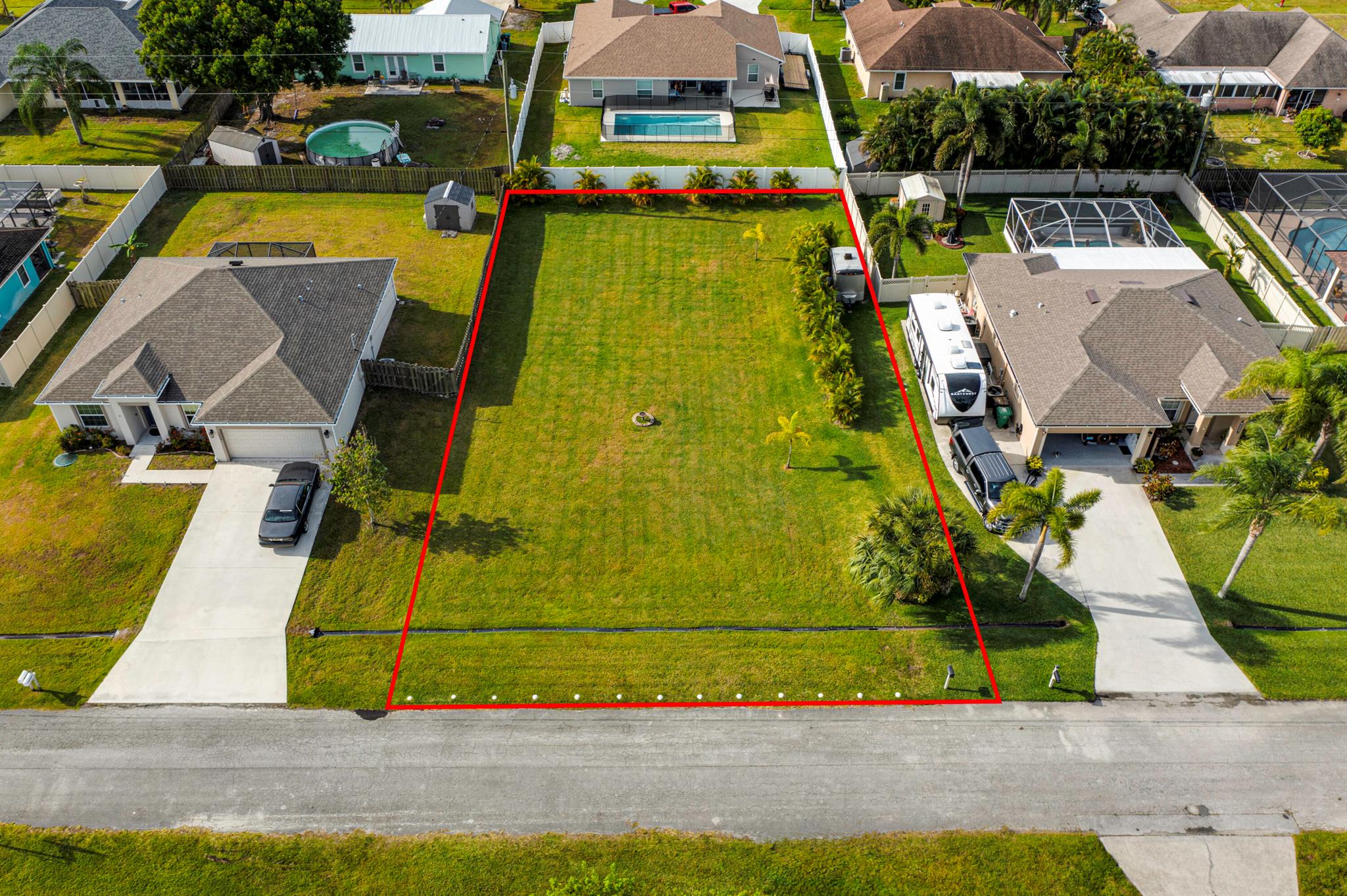 Uncover the ideal spot to construct your dream home along this outstanding street in Central Port St Lucie. This premier lot flaunts an unbeatable location, granting easy access to the plethora of remarkable amenities that Port St. Lucie has in store. Don't miss out on this incredible opportunity - grasp the moment and reach out to us today!
