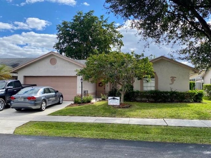 Rarely available in this desirable, small, well-maintained, quiet community is this one story, 3 bedroom, 2  baths with beautiful view of the lake. Double car garage with storage. Nice sized bedrooms. Large screened patio. Personalize and you are  all  set  to enjoy the open and airy feeling in this great room style home.  Lots of flexibility with open interior areas looking out onto serene landscaping.  Close to top rated schools and shopping.