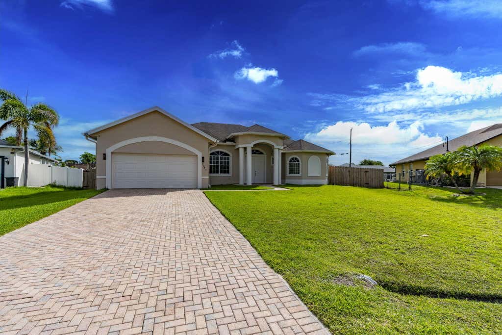 Photo of 2301 SW Vale ST, Port Saint Lucie, FL 34953 (MLS # B26038304)