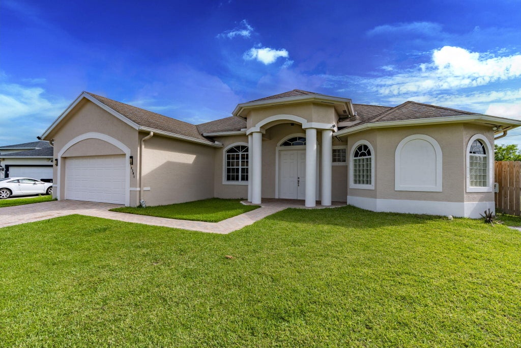 Photo of 2301 SW Vale ST, Port Saint Lucie, FL 34953 (MLS # B26038304)