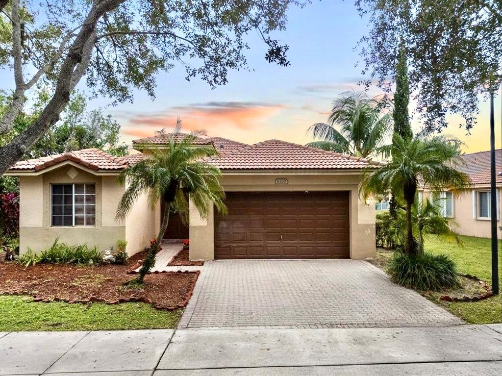 Stunning lake view, all upgraded, 4 bed & 2 1/2 bath, cul-de-sac property in the desirable Regency Lakes community. The property features a triple split floor plan, fully upgraded kitchen, New A/C & Water Heater, bathrooms and light fixtures, along with all new modern flooring and volume ceilings. Spacious private backyard where you can enjoy your own multi-variety tropical fruit trees including various genre of mangoes, lychees, and lime. Community pool, clubhouse, gym, volleyball and tennis courts. The home is just a few walking minutes away from local shops, groceries, fine dining, parks, and top-rated schools. With all upgraded features, unparalleled lake views, this home is truly one-of-a-kind. HOA INCLUDES High speed AT&T fiber optic internet. ADT home security & landscaping.