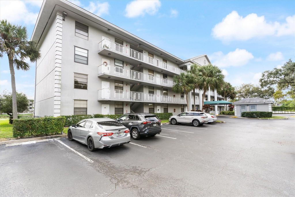 Photo of 1520 Whitehall Drive #404, Davie, FL 33324 (MLS # F10462624)